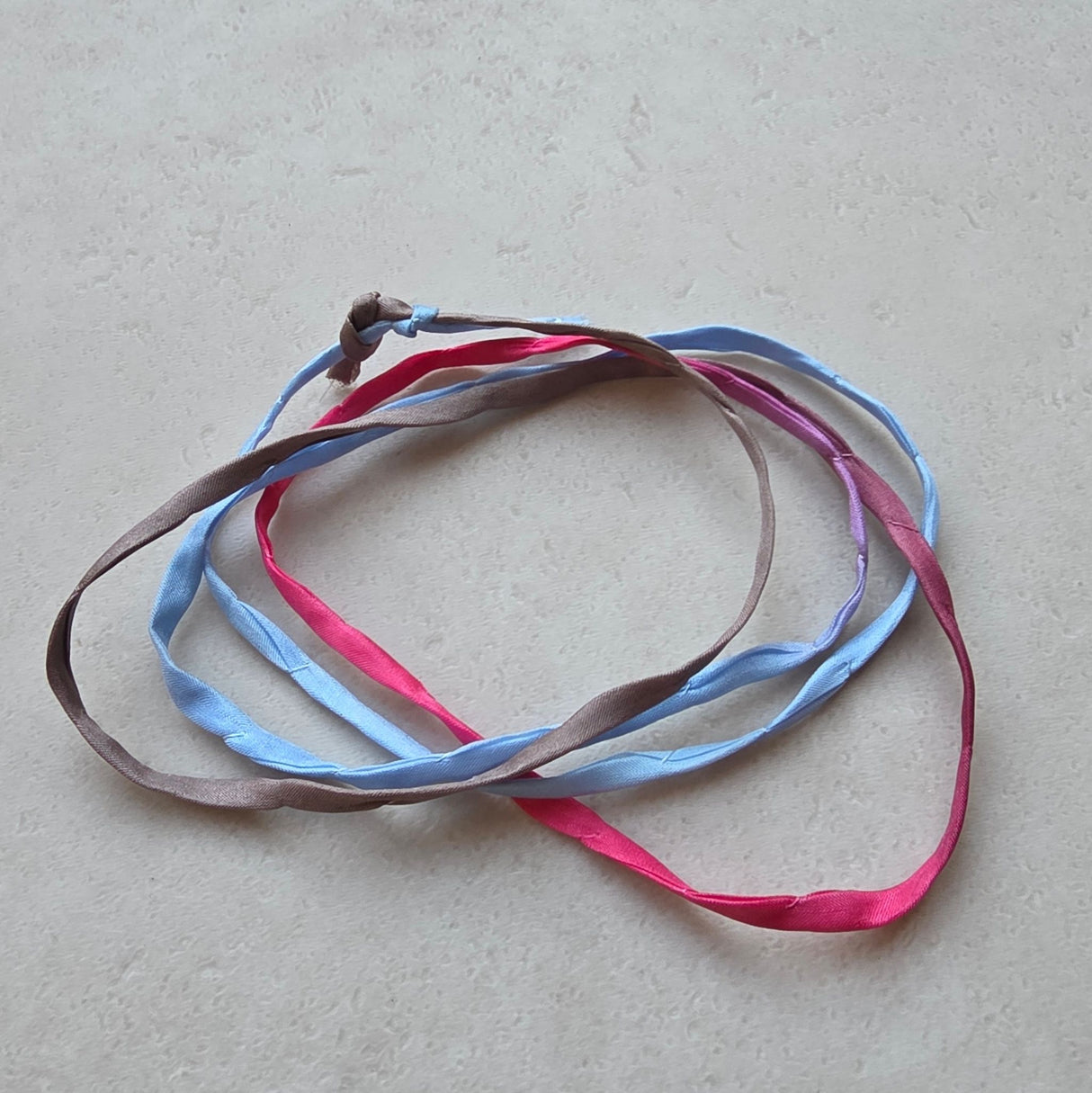 Zonnestraaldraadje Tussen Hemel & Aarde - bruin-lila-roze-blauw