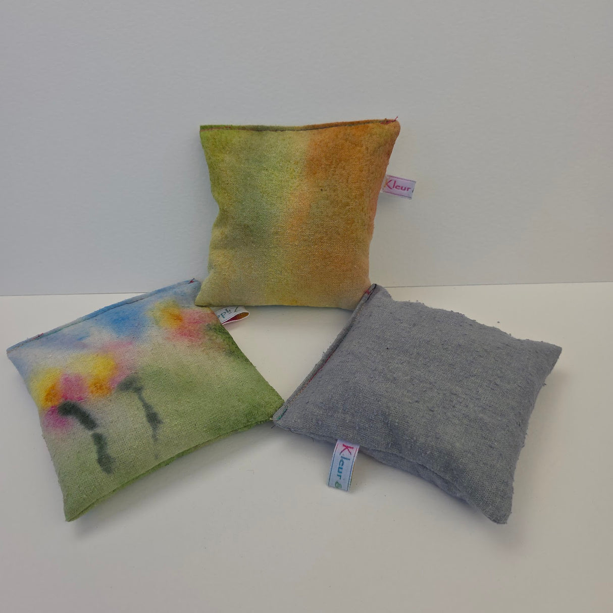 Detail pittenzakjes RegenBoogbloem