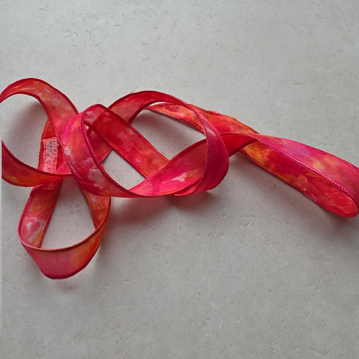 Zijden smal haarlint ZomerBloei - 110 x 2 cm - rood, magenta en oker