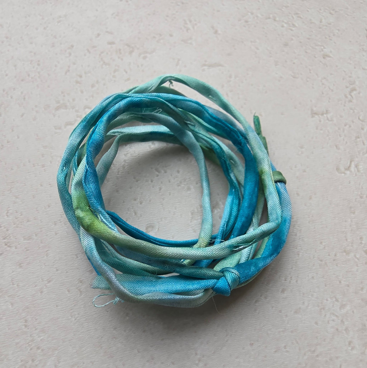 Zonnestraaldraadje ZeeWier – zachtgroen, oceaanblauw en zeewiergroen